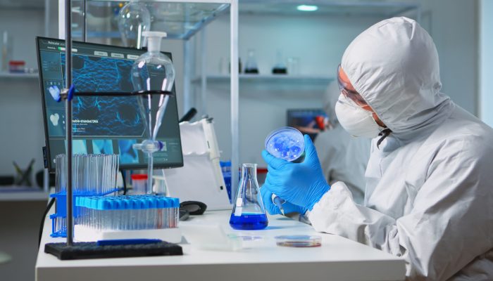 Chemist in ppe suit using micropipette for filling test tubes in modern equipped laboratory. Team of scientists examining virus evolution using high tech for vaccine development against covid19 SSUCv3H4sIAAAAAAAACpRVy47cNhC8B8g/LHQOETbfyhfk4pOPQQ4UyZkhLIkDPewYi/33tDSShtLKaxiYw7Cr2GxWs0uvv//28lJUto+u+OvldVrhOtb12A+dHWJqMUz/WOJdaH3o8sjXjiuaB4KPQ+qirfNgZQd3a20TMNiOdT2F32aw6Ac7jH3os9PvtzQkP7YTm68pmui61A/JfbljbYjAhmB43rKL+i7Yph/ifCbTaxgY7y67SBWvj7RTivxEl+o0dlX6L0/b38ZhCN28Y5fGh3vq47OQJ3JPrZe7iK1t830f8akK75M62+5qeyJNmnoT6tCEdujzssP3EJqp5ExkZ4dwxa7sZF6b/s9j/bICy8kDQsXfwdbDzdku/PkJO+uwrcs5DzXGamJ9ir0LdW3bkLA1K/44+weJP7sYWhd+Idvjz7+bYlfcP4n4+pZdtENF7OM1LdcqlBdSQ2kIc5YTQRklptSeWK6B+YpZ8Je1jMJzqi0NmtDgL0RUjBFjGCdMOx+MdFQxtZEZNVaBVQSAKSKE0sRQLQituAdnJNhSzfU/ii6+fMOX08wtWMq1o48pa8nXhArP3czudO+ii+0125aG2zyF6zaXxnboJjGKrbg6pbut6un1XzBnWOM32/dI92s8fyU486nJzmnTMEu5ZC08PqNpCZwpClBKZUrFhGRQ5MN8i5hnLmctcLzXyfowHbq9hZOJViApoN6rb7wb7plQglnH8TjnC0Eb8SSsE3+GHWf/jLOzgRP84AhnlKM3nHFWlzjDVr84xXLnWAgllVn9Bw+ZOYxSlnHeuclEAgqaZ63YjAUxhTPFzQNa53ya3yaiFvs2524OihrNlAD1E3EYdo3+oIcH7LSHDLj88JEcCDv1GQgNHynMQJbsp+oxlZPyHjLNpdYft0gopalYFN59L5EYfW7kRwULISWjQPXTqlYBUQl7Tb3D66IkDCin+NMb7yhmIdDbWFmqZyqfa1lgM1AsA2LDVykLEKVRimmzQTslMbURBrRiG/5OyAIU11KUi79kMhZQ+sAC2vrFayCCc0pKCRUpPQ8BLtW24yhuUVKuNAiYrXlRNU5vttDUBnDBEOMlfip4eSE2SEa01N5aE5i8MNz19j8AAAD//wMAKDaUrjUJAAA=